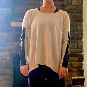 Sweater with faux leather details